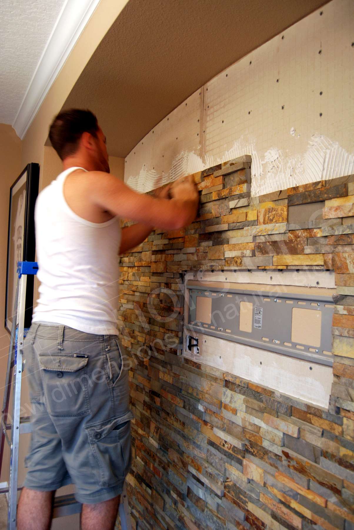 Flat Screen TV installed on Stacked Stone Wall   Installing Stone